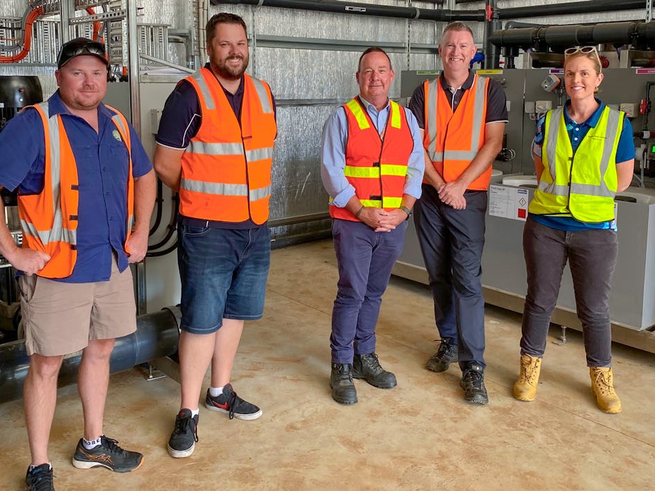 Phillip Demark, Peter Smith and Daniel Jacometti from Boomaroo Nurseries show Darren Milverton and Laura Kendall from Barwon Water the new water recycling plant made possible with their grant. (Image source: Barwon Water)