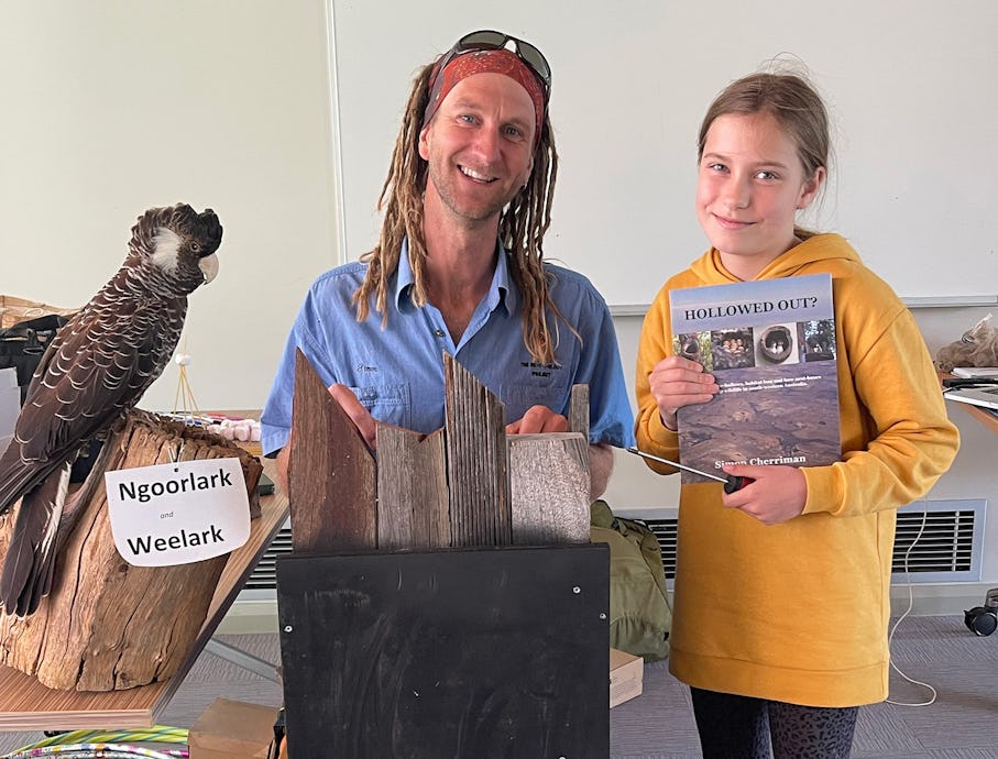 Simon Cherriman and Isabelle talking about the black cockatoo (Image credit Sara Foster)