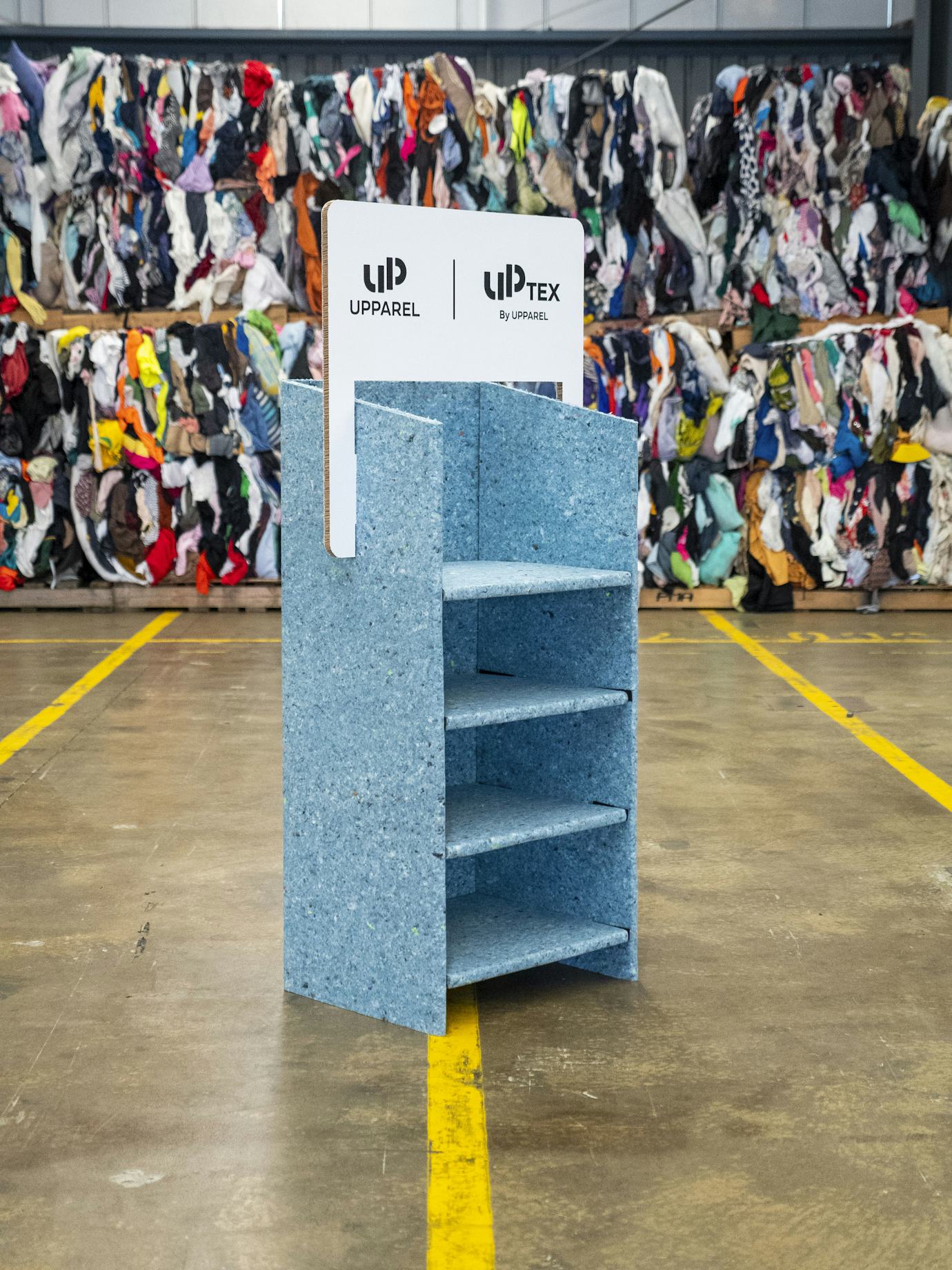 Stand made from UPtex recycled textiles material. Image Source: UPPAREL